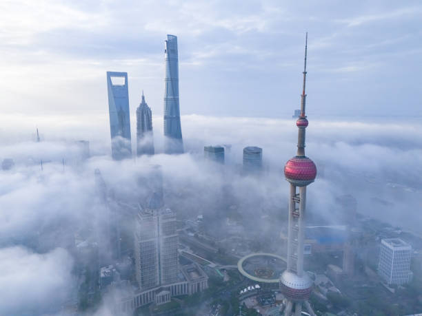istock Aerial View of Shanghai Skyline on Thick Cloud, China 2187481294