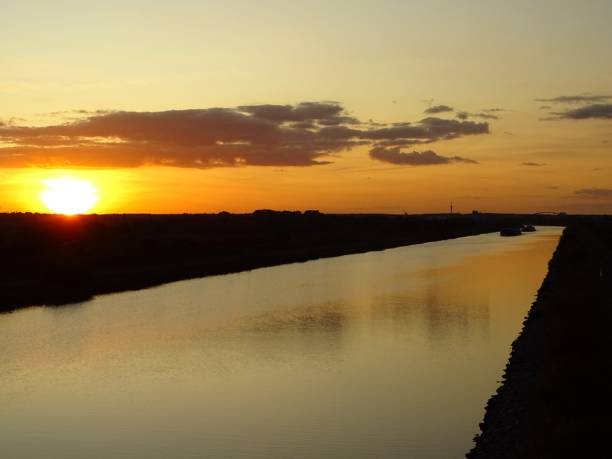 istock Ship sails on the canal into the sunset 2187486905