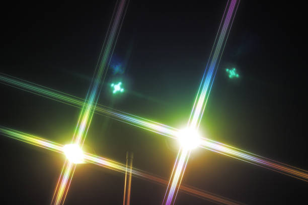 istock Two street lights with rainbow colored flares 2187497868