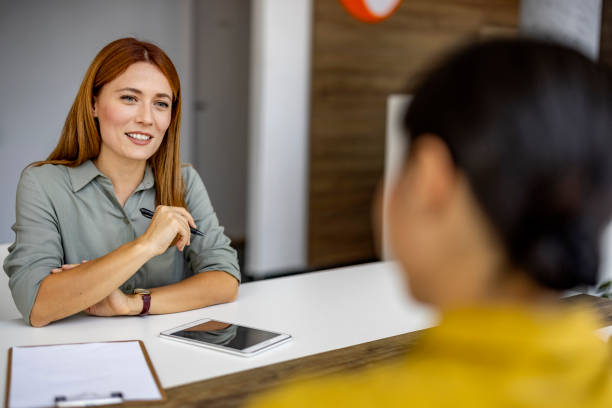 Woman Conducting Job Interview in Modern Office Setting