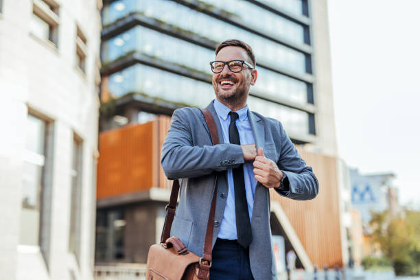 istock Confident Businessman Smiling Outdoors in Urban Environment 2187502478