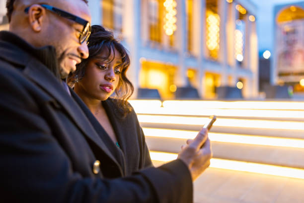istock Evening Elegance: Couple Outside Manhattan Opera House 2187503787