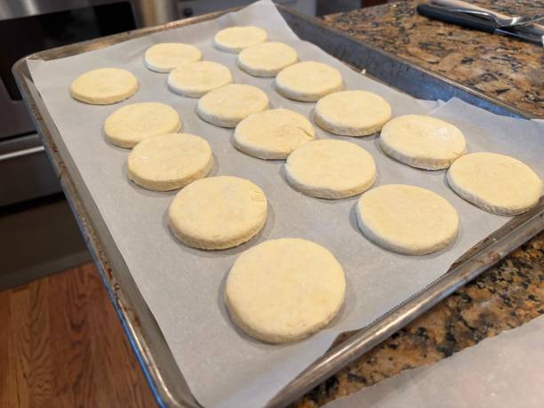 istock Buttermilk biscuits on a baking sheet ready for the oven 2187505430