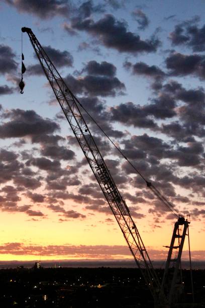 istock Sunrise with Construction crane and Jody cloudy cloudy sky 2187519245
