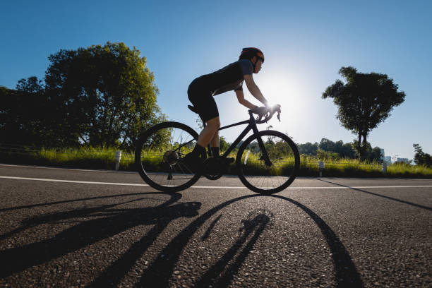 istock Woman cycling on summer park trail 2187523446
