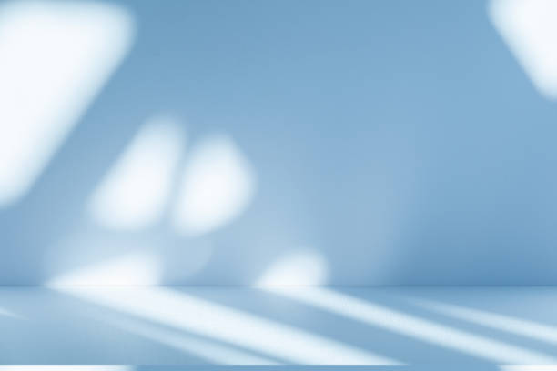 istock Studio style background wall decoration presentation uses white and blue tones. with shadows cast from a nearby window, concept creating a decorative 2187523969
