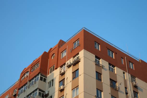 istock Modern residential building against a clear blue sky during golden hour 2187529221