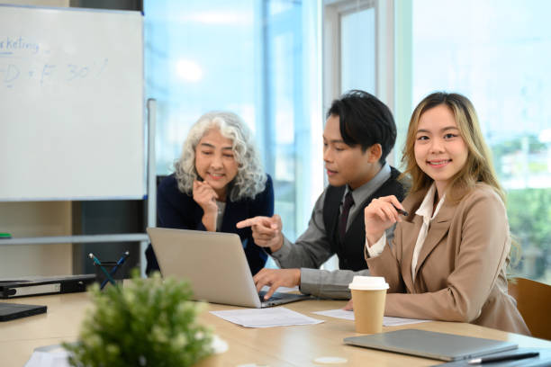 istock Professional businesspeople analyzing financial data on laptop and planning work at meeting 2187531152