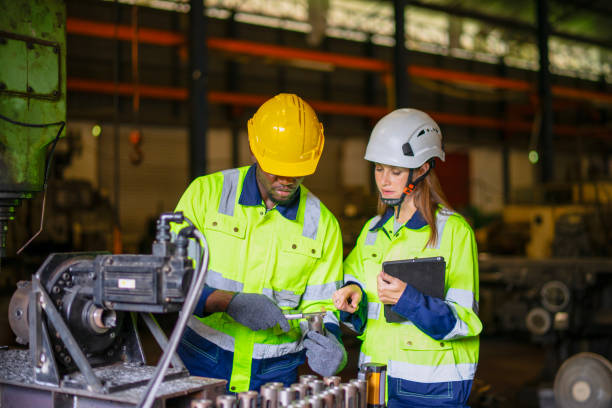 istock Blue collar workers are working at metal work factory. 2187531660