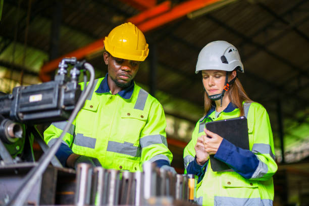 istock Blue collar workers are working at metal work factory. 2187531664