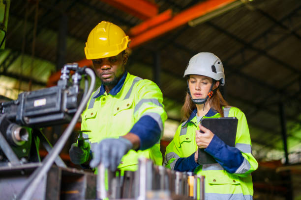 istock Blue collar workers are working at metal work factory. 2187531666