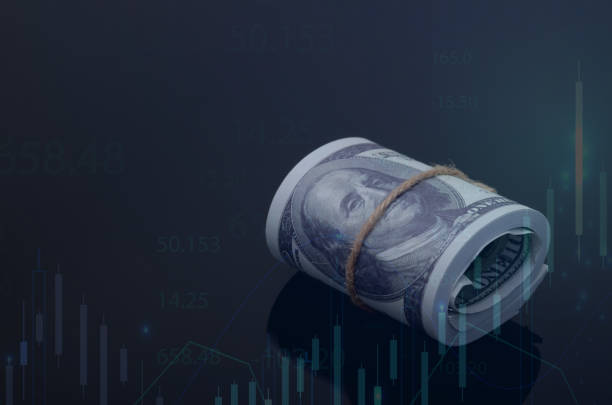 istock USD Currency and Fluctuating Graph Chart: Financial Trends on a Black Background 2187534502