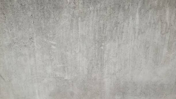 istock Grungy, textured concrete wall. Perfect for industrial backgrounds. 2187537339