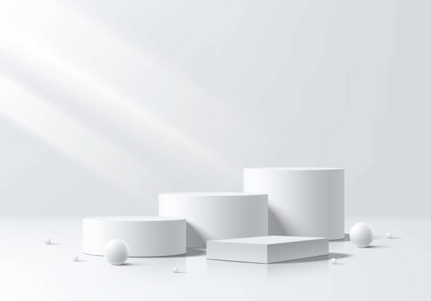 istock 3D white cylindrical podium background with cube box and sphere beads ball. Minimalist mockup pedestal. Abstract stand product display scene presentation, Stage for showcase. Vector platforms design. 2187539402
