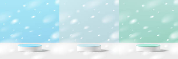 istock Set of 3D cylindrical podium in green, light blue n white background with snow fall. Merry Christmas scene. Minimalist mockup pedestal. Abstract stand product display presentation. Stage for showcase 2187539461