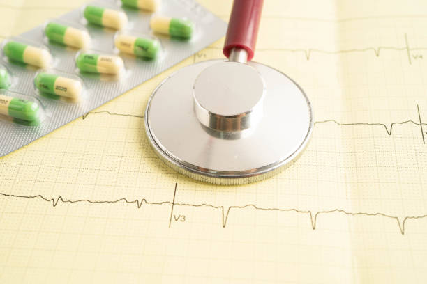 istock Stethoscope on electrocardiogram ECG, heart wave, heart attack, cardiogram report. 2187540620