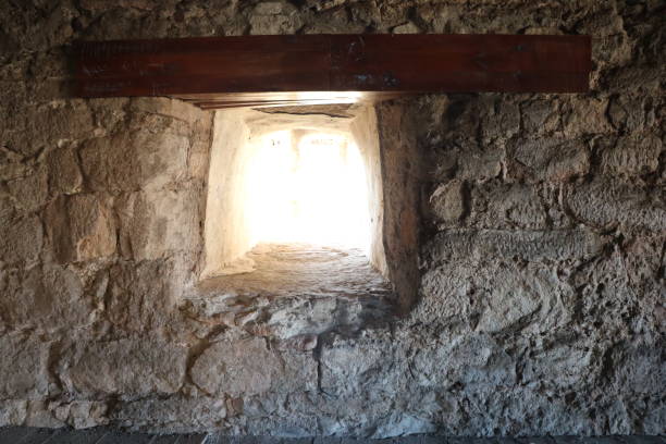 istock A Stone Wall featuring a Window Opening is a notable feature in Historical Architecture 2187541497