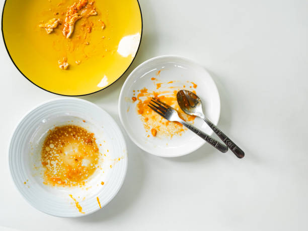 istock Dirty plate top view background, finished eat dinner in restautant, abstract textuer stain smearing drip sauce bbq jam chilli jelly on ceramic breakfast, concept for clean hyginene product. 2187541597