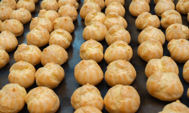istock Rows of test blanks for profiteroles lying on the counter 2187545027