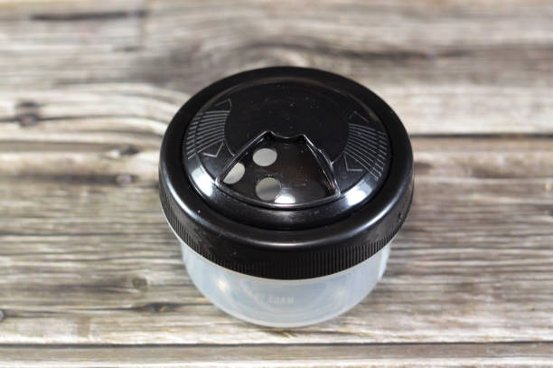 istock A Plastic jar for spices with a twist cap with holes to control the amount 2187547326