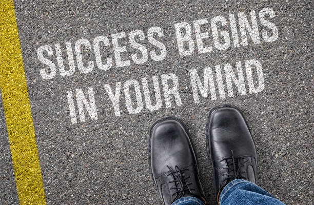 istock Text on the road - Success begins in your mind 2187548089