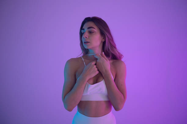istock Fitness girl in neon light. 2187549273