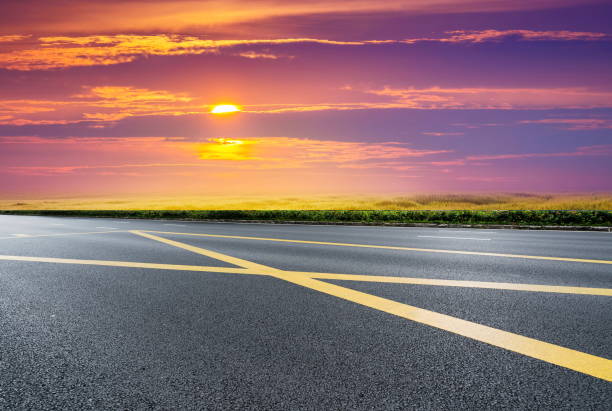 istock sunset empty road sky cloud nature landscape outdoor travel horizon 2187549821