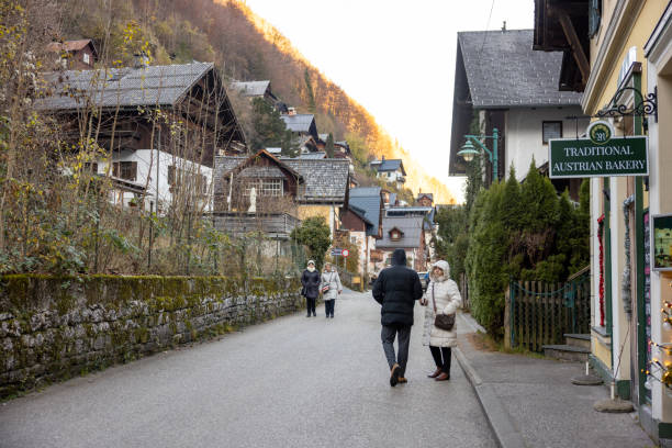 Austria, Vienna-November 17,2024:  Tourists walking around the Hallstatt  street