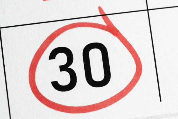 istock Thirtieth number in calendar is circled with red marker. 2187561180