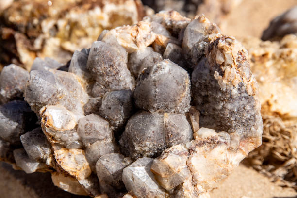 istock Close-up of agate stone with gray and white crystal structures 2187564332