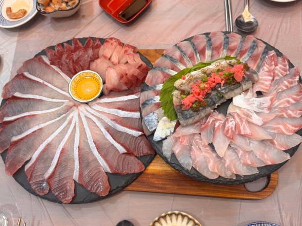 istock Sliced raw Yellowtail, mackerel, and red snapper are on the list. 2187566376
