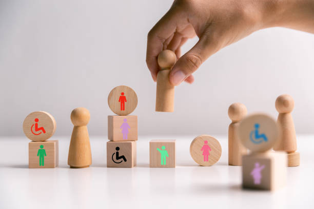istock Concept of diversity, inclusion and equality promotes community integration, where every person, regardless of disability, is embraced through teamwork and equity in colourful, supportive environment 2187566442