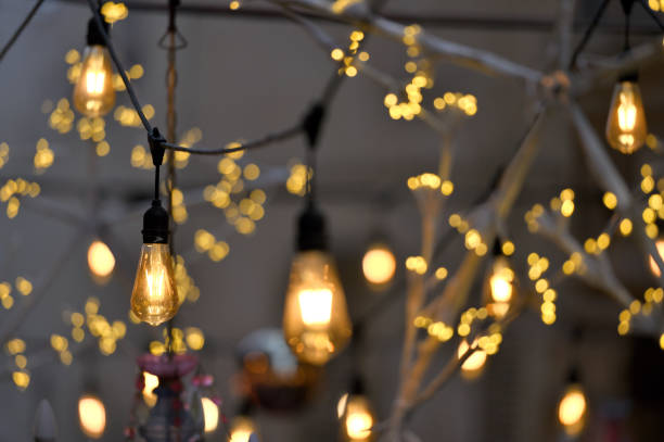 istock Christmas decorative yellow, golden, white flashing lights 2187566671