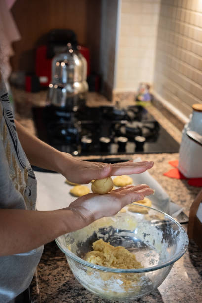 istock Close up woman preparing cookie balls in home kitchen 2187570221