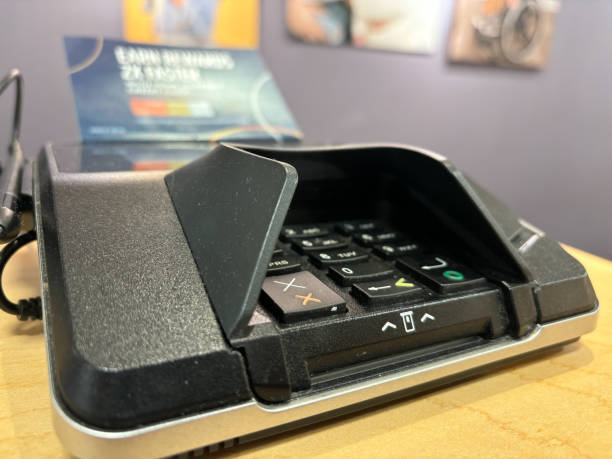 istock A credit or debit card reader in portrait studio cashier desk 2187572355