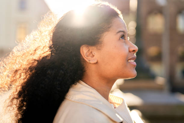 istock Thoughtful female tourist exploring city on sunny day 2187572468