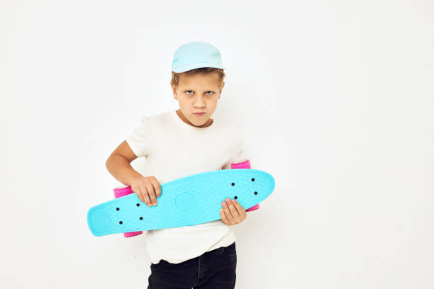istock adorable stylish boy active rest entertainment isolated background 2187572619