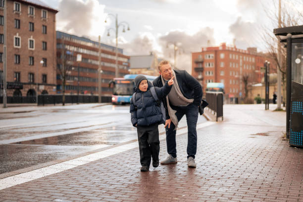 istock Son pointing to father while exploring Scandinavian city 2187576450