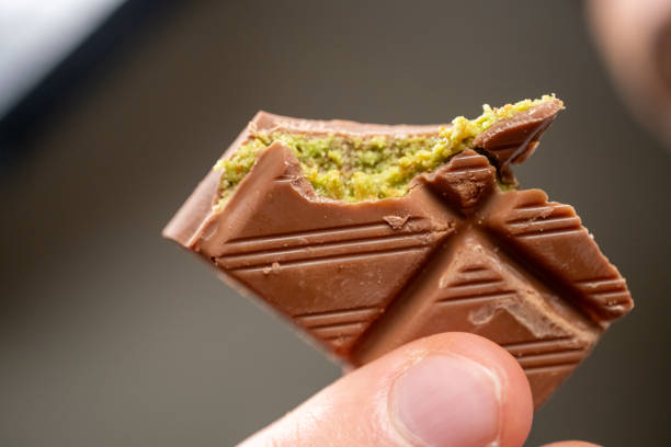 istock Dubai chocolate with pistachios on a plate on a white background in close-up 2187578067
