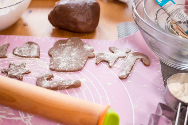 Bakery ingredients and tools stock, We make dough for pies on a wooden tabletop, Tools and ingredients for making gingerbread cookies, Cooking backgrounds: fresh vegetables and kitchen utensils frame, background for countertop recipe
