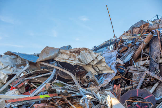 istock Scrap Metal Wall Against Blue Sky - Industrial Recycling Texture 2187585040
