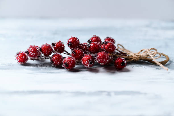 istock Christmas branch on rustic wooden background. Copy space. 2187588641