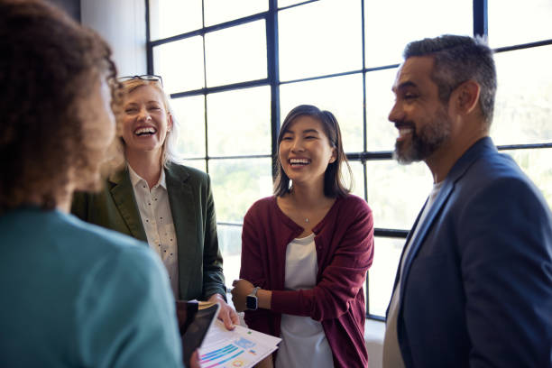 istock Happy business team having happy conversation 2187592435