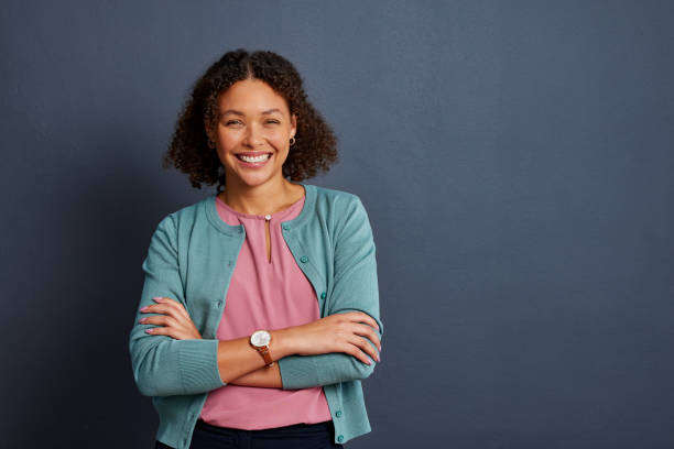 istock Smiling african american woman looking at camera 2187592522