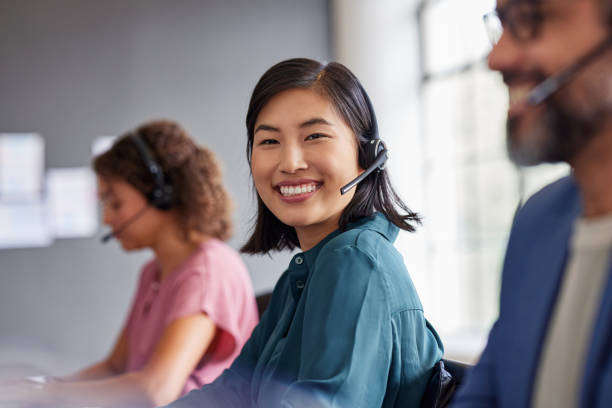 istock Portrait of smiling chinese customer service agent 2187593287