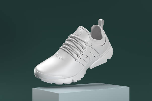 istock A white shoe with a black logo on the side 2187595162