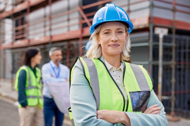 istock Proud mid adult woman engineer at construction site 2187596742