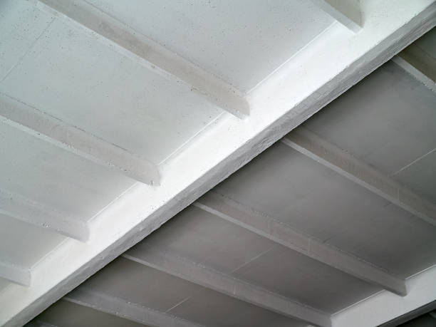 istock Ceiling concrete floor slab and beams structure, concept image for modern and contemporary architecture diagonal composition selective focus shot. 2187597977