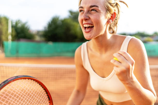 istock Woman celebrating a point during a tennis match 2187604628
