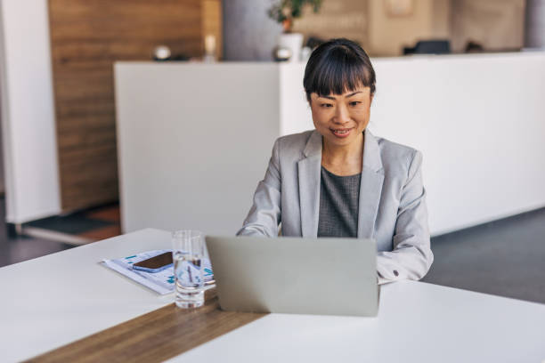 istock A businesswoman is working on a laptop in a modern office 2187605657